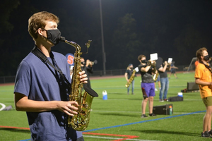 After one member of the marching band tested positive for COVID-19, added safety protocols have been put into place to allow SU to continue practicing in-person.