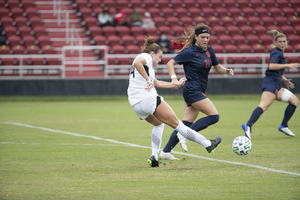 Lindsey Brick defended a Louisville player in Syracuse's 3-0 loss on Thursday.