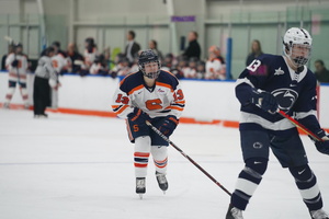 Abby Moloughney scored a second-period goal and assisted another in the third period as Syracuse won 4-2. 