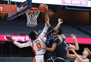 Syracuse overcame a 16-point deficit to defeat Buffalo 107-96 in overtime.