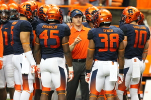 At Syracuse, former linebacker coach Clark Lea coached NFL talent like Zaire Franklin (left) and Cameron Lynch (right). 