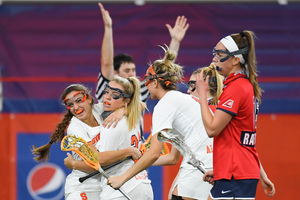Megan Carney (middle) was one of five Syracuse players named to the Tewaaraton Watch List. 