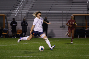 Jenna Tivnan attempts to clear the ball versus Boston College.