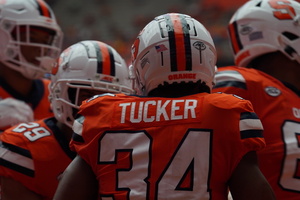 Tucker rushed for 153 yards and two touchdowns on the ground in addition to a 28-yard touchdown catch late in the fourth quarter that sent the game into overtime.