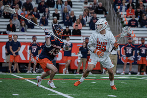 Syracuse's offense played well, but UVA scored at least 20 goals for the second time this season against the Orange. 