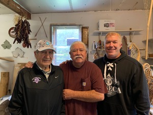 Alf Jacques (middle) has been a stick-maker on the Onondaga Nation Reservation for over 50 years.